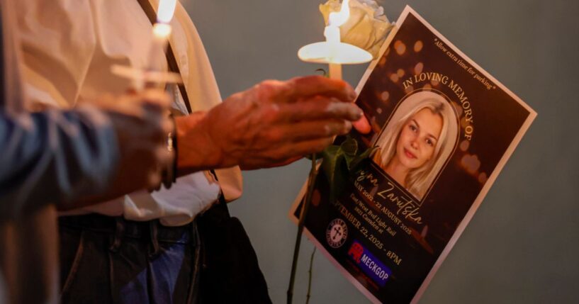 Members of the local community hold a vigil in honor of the late Iryna Zarutska on Sept. 22, 2025, who was stabbed to death on a commuter train by a repeat offender.
