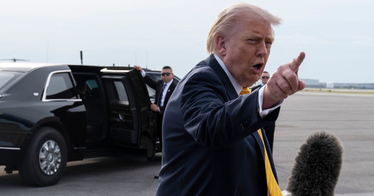 President Donald Trump speaks to journalists at Palm Beach International Airport on May 2, 2026 in Palm Beach, Florida.