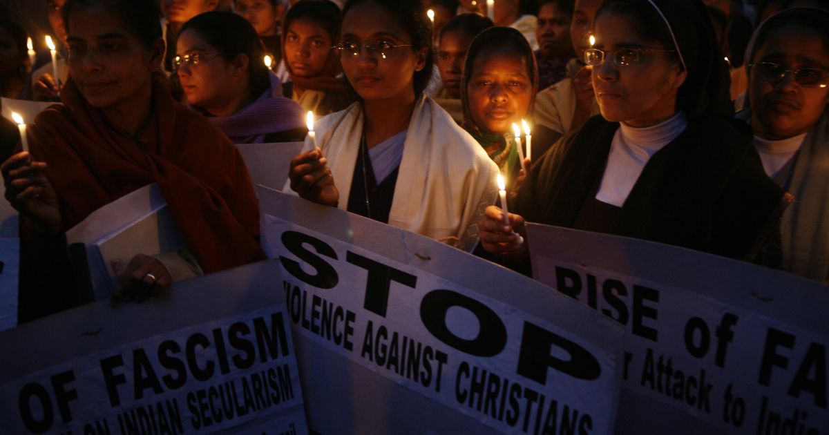 Indian Christians join in prayer to protest the killing of Indian Christians in New Delhi on Dec. 27, 2007.