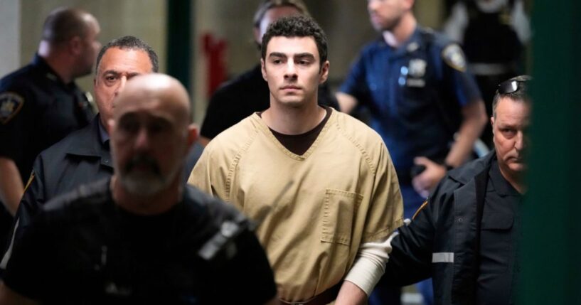 Luigi Mangione is escorted into the Manhattan state courthouse in New York on Sept. 16, 2025.