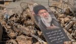 A portrait of Iran's former supreme leader, the now-deceased Ayatollah Ali Khamenei, sits on a pile of debris in the southern suburb of Dahieh, Lebanon on May 6, 2026.