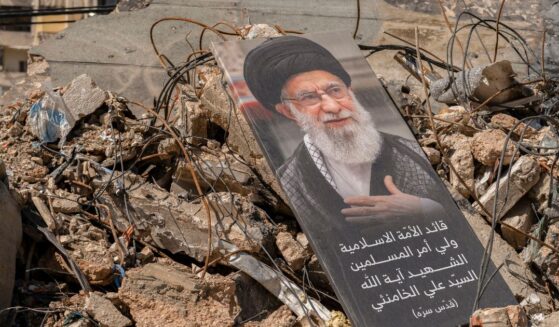 A portrait of Iran's former supreme leader, the now-deceased Ayatollah Ali Khamenei, sits on a pile of debris in the southern suburb of Dahieh, Lebanon on May 6, 2026.