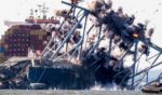 A crew conducts a controlled demolition of debris from the Francis Scott Key Bridge after the Dali container ship crashed into it in Baltimore on May 13, 2024.