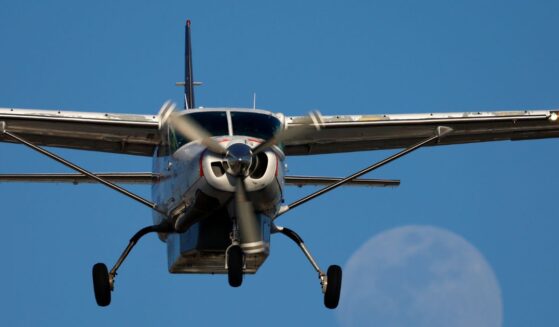 A FedEx Cessna Super Cargomaster airplane flies to San Diego International Airport in San Diego on May 9, 2025.
