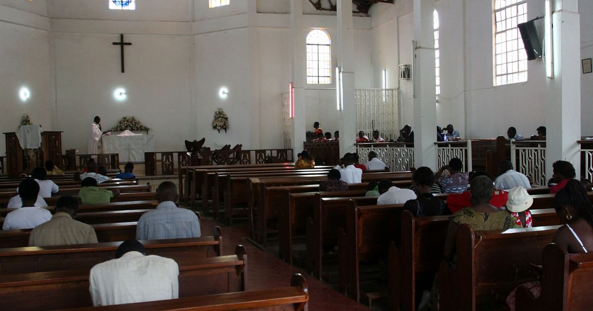 Christians sit in the pews of a Pentecostal church in Kampala, Uganda on July 20, 2009.