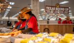 Employees prepare food inside a convenience store within this popular chain in Luling, Texas, on July 12, 2024.