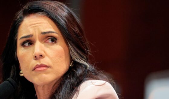 Director of National Intelligence Tulsi Gabbard looks on during a House Select Intelligence Committee hearing on March 19, 2026 in Washington, DC.