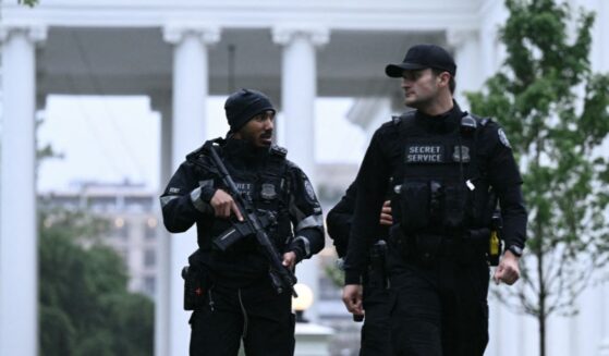 Secret Service Agents patrol outside the White House in Washington after shots were fired nearby, prompting a lockdown on May 23, 2026.
