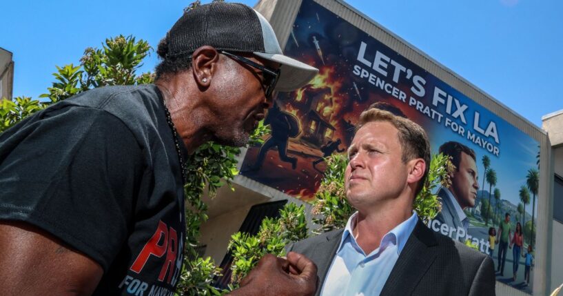 Los Angeles Mayoral candidate Spencer Pratt meets with a concerned citizen during a campaign "block party" event May 20.