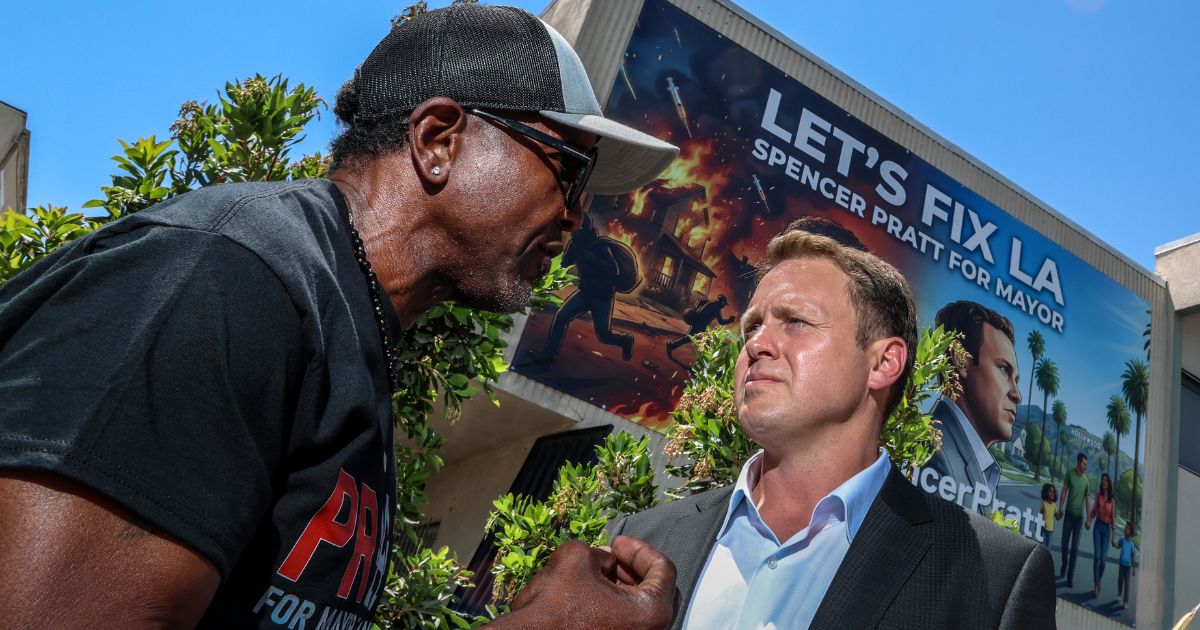 Los Angeles Mayoral candidate Spencer Pratt meets with a concerned citizen during a campaign "block party" event May 20.