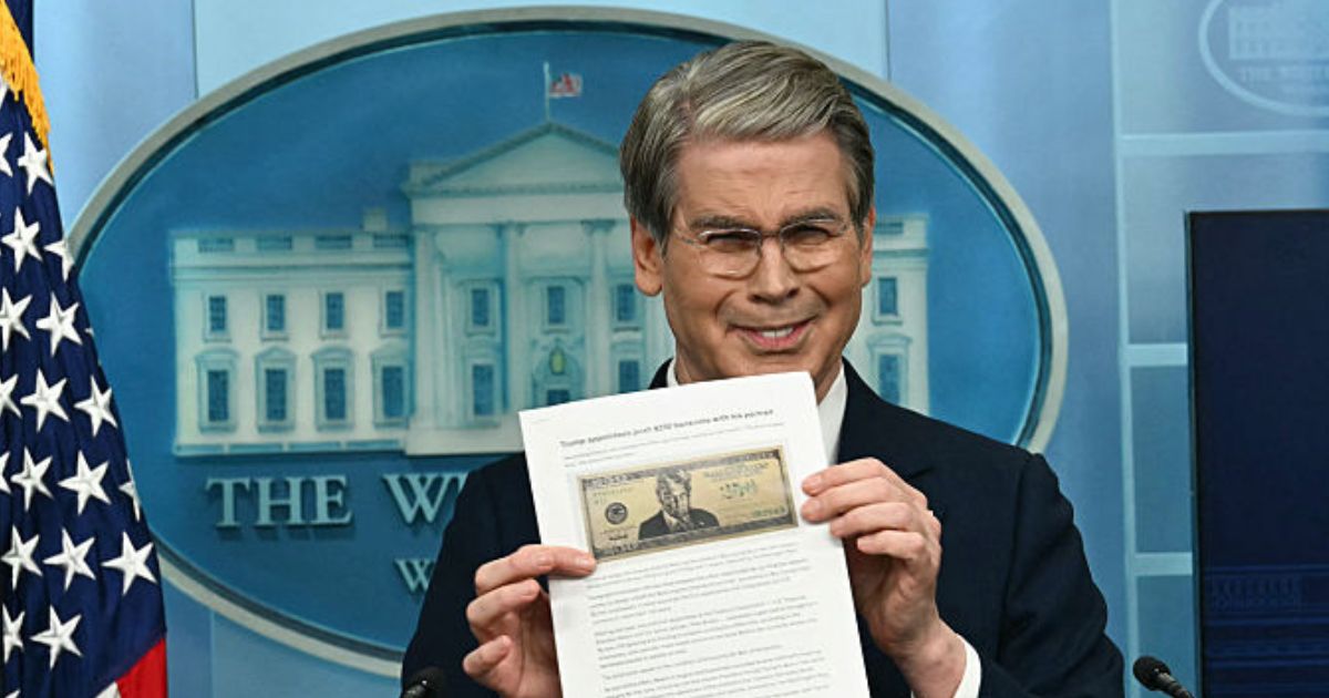 Treasury Secretary Scott Bessent shows a proposed $250 bill featuring President Donald Trump during a press briefing Thursday at the White House in Washington, D.C.