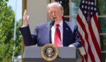President Donald Trump delivers remarks Friday in the Rose Garden of the White House.