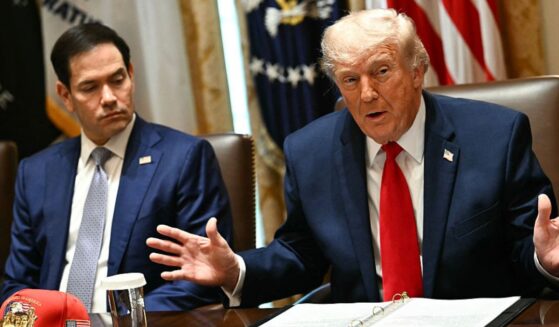 President Donald Trump speaks alongside Secretary of State Marco Rubio during a cabinet meeting Wednesday at the White House in Washington, D.C.