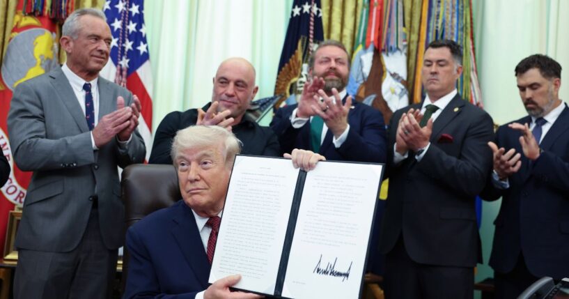 President Donald Trump shows his signature in the Oval Office after signing an executive order April 18 directing the Food and Drug Administration to issue new guidance on the use of psychedelic drugs intended for clinical trials for U.S. veterans suffering from Post Traumatic Stress Disorder.