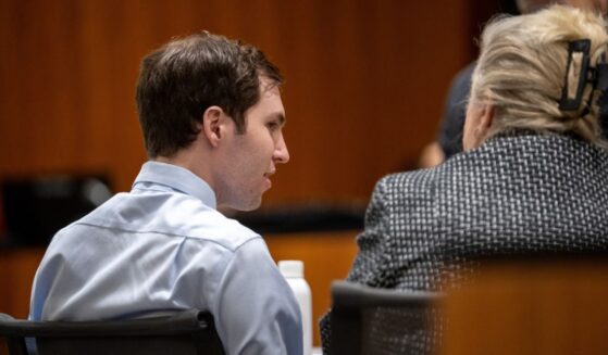 Tyler Robinson, left, speaks with his attorney Kathryn Nester in 4th District Court in Provo, Utah, on April 17.