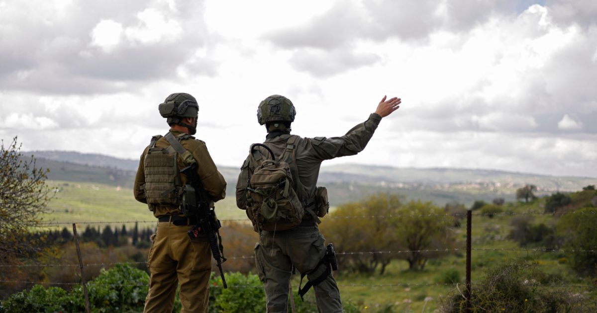 Israeli soldiers patrol along the Israel-Lebanon border on April 10, 2026.