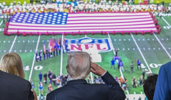 President Donald Trump salutes as the national anthem is played before the start of Super Bowl LIX between the Kansas City Chiefs and the Philadelphia Eagles at Caesars Superdome in New Orleans, Louisiana, on Feb. 9, 2025.