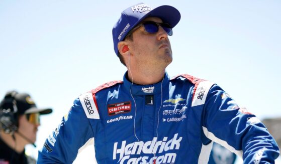 Kyle Busch, driver of the HendrickCars.com Chevrolet, looks on during practice for the NASCAR Craftsman Truck Series ECOSAVE 200 at Dover Motor Speedway on May 15, 2026, in Dover, Delaware.