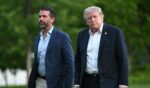 President Donald Trump and Donald Trump Jr. walk on the south lawn toward the White House in Washington, D.C., on May 3, 2026.