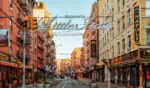A low angle view of a Little Italy street sign in New York City.