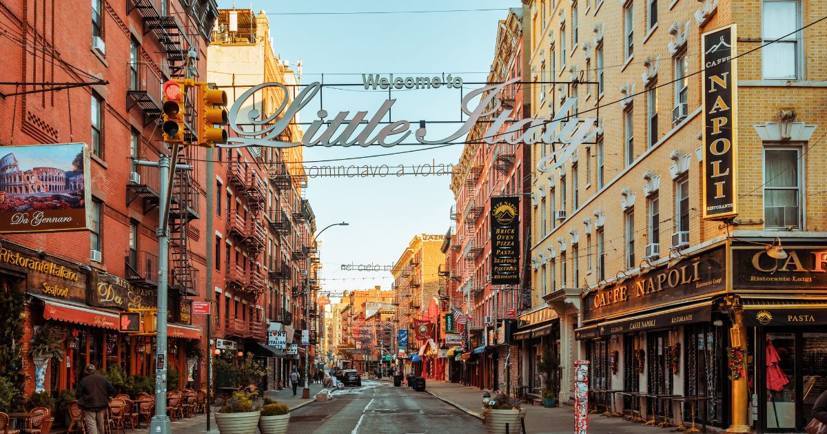 A low angle view of a Little Italy street sign in New York City.