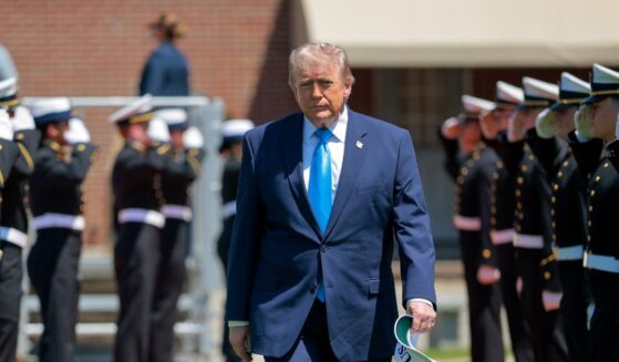 President Donald Trump arrives to the commencement ceremony on Cadet Memorial Field at the United States Coast Guard Academy on May 20, 2026, in New London, Connecticut.