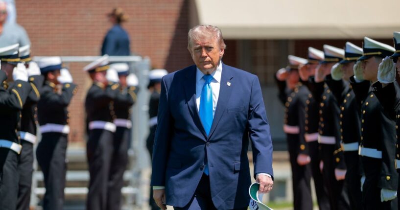 President Donald Trump arrives to the commencement ceremony on Cadet Memorial Field at the United States Coast Guard Academy on May 20, 2026, in New London, Connecticut.