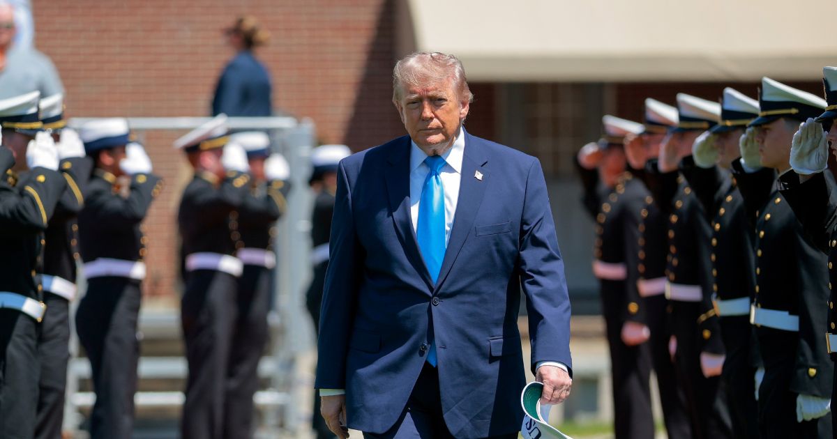 President Donald Trump arrives to the commencement ceremony on Cadet Memorial Field at the United States Coast Guard Academy on May 20, 2026, in New London, Connecticut.