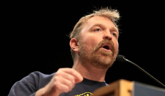 Democratic Senate candidate Graham Platner speaks at a “Fighting Oligarchy” tour stop held by Sen. Bernie Sanders at the Collins Center for the Arts on the University of Maine campus on May 24, 2026, in Orono, Maine.