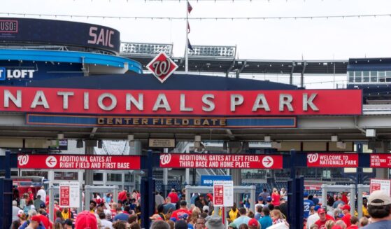 The fans walking into an early morning baseball game between the Nationals and the Mets on July 4, 2017, in Washington, D.C.