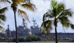 The USS Mahan, an Arleigh Burke-class guided-missile destroyer, is docked at the port of Ponce, Puerto Rico, with the USS Iwo Jima, a US Navy Wasp-class amphibious assault ship, in the background on Jan. 15, 2026.