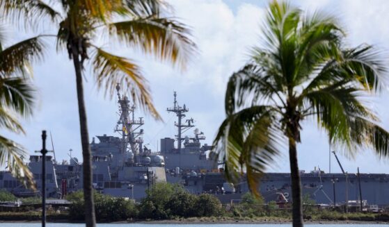 The USS Mahan, an Arleigh Burke-class guided-missile destroyer, is docked at the port of Ponce, Puerto Rico, with the USS Iwo Jima, a US Navy Wasp-class amphibious assault ship, in the background on Jan. 15, 2026.