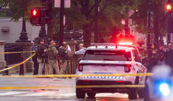 Emergency teams work the scene after multiple gunshots ring out outside the White House on May 23, 2026, in Washington, D.C.