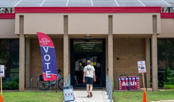 A person prepares to vote at the South Austin Recreation Center on May 26, 2026, in Austin, Texas.