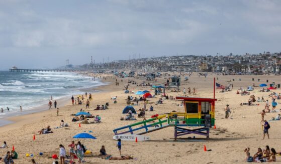 A packed beach during the Memorial Day holiday weekend on May 25, 2025, in Hermosa Beach, California.
