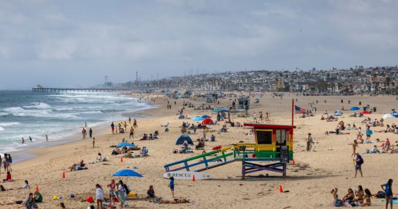 A packed beach during the Memorial Day holiday weekend on May 25, 2025, in Hermosa Beach, California.