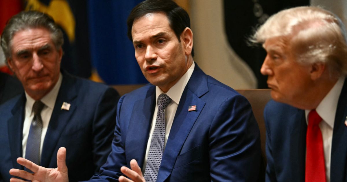 Secretary of State Marco Rubio speaks alongside Secretary of the Interior Doug Burgum and President Donald Trump during a meeting in the Cabinet Room of the White House in Washington, D.C., on May 27, 2026.