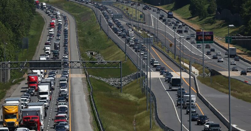 Heavy Memorial Day traffic moves southbound and northbound along I-95 on May 22, 2015, in Quantico, Virginia.