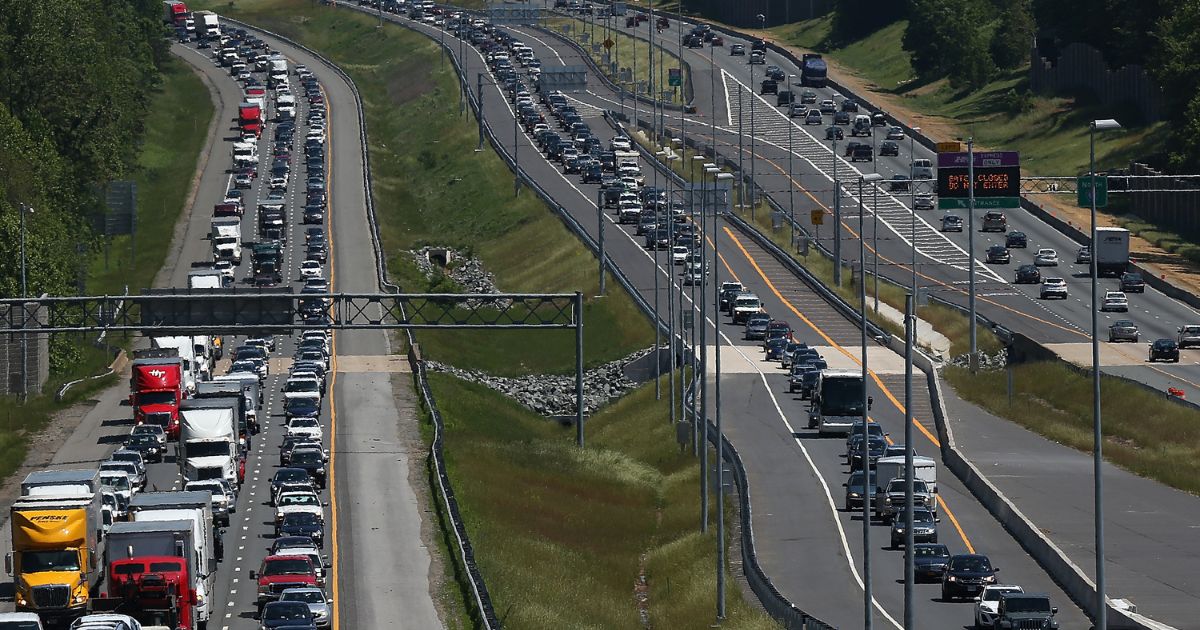 Heavy Memorial Day traffic moves southbound and northbound along I-95 on May 22, 2015, in Quantico, Virginia.