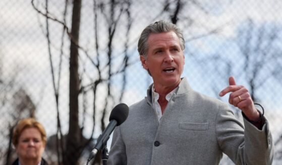 Gov. Gavin Newsom speaks at a press conference at Odyssey Charter School as work begins to remove debris from the Eaton Fire in Altadena, California.