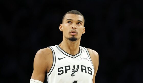 Victor Wembanyama of the San Antonio Spurs looks on during the first quarter against the Minnesota Timberwolves in Game Four of the Second Round of the NBA Western Conference Playoffs at Target Center on May 10, 2026, in Minneapolis, Minnesota.
