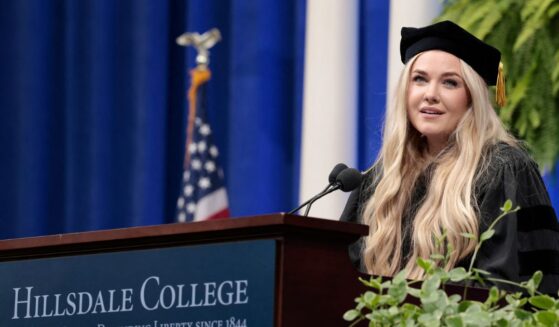Erika Kirk, Turning Point CEO and widow of founder Charlie Kirk, delivers a commencement address at Hillsdale College during the college's 174th commencement ceremony in Hillsdale, Michigan, on May 9, 2026.
