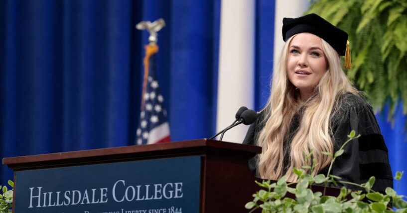 Erika Kirk, Turning Point CEO and widow of founder Charlie Kirk, delivers a commencement address at Hillsdale College during the college's 174th commencement ceremony in Hillsdale, Michigan, on May 9, 2026.