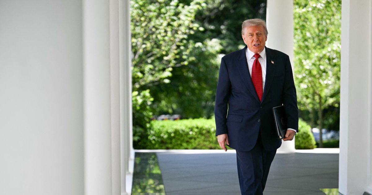 President Donald Trump exits the Oval Office and arrives to speak during a Mother's Day luncheon in the Rose Garden of the White House in Washington, D.C., on May 8, 2026.