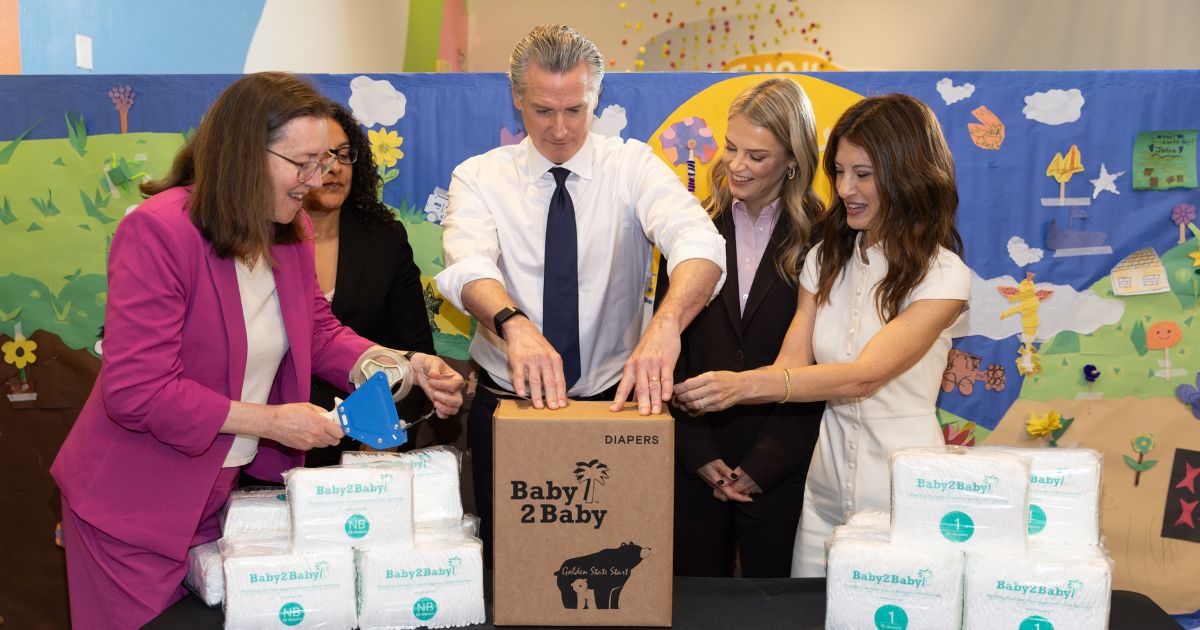 Elizabeth Landsberg, Kim Johnson, Gavin Newsom, Kelly Sawyer Patricof, and Norah Weinstein fill diaper boxes at the Baby2Baby x Golden State Start event at Children’s Creativity Museum on May 8, 2026, in San Francisco, California.