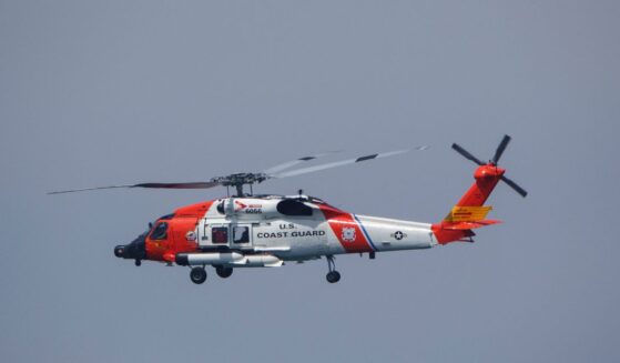 A U.S. Coast Guard Sikorsky MH-60T Jayhawk helicopter flies to the U.S. Coast Guard Sector San Diego air station on June 28, 2025, in San Diego, California.