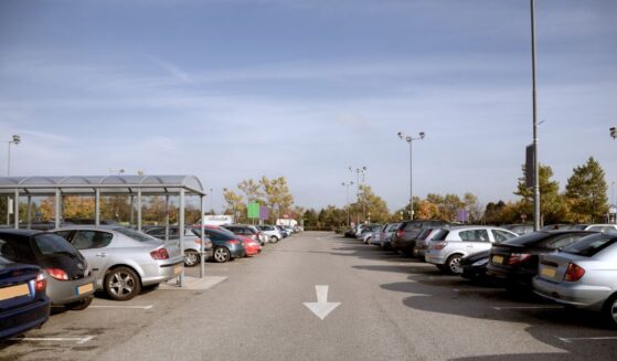 Cars in a shopping center.