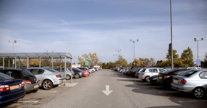 Cars in a shopping center.