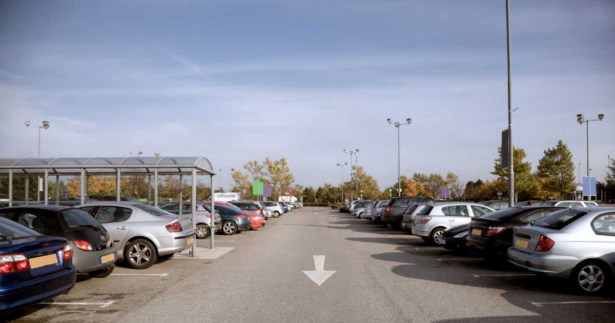 Cars in a shopping center.