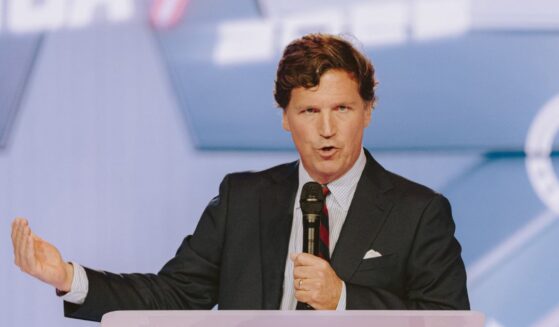 Conservative political commentator and podcast host Tucker Carlson speaks at Turning Point USA's annual AmericaFest conference, in remembrance of late political activist Charlie Kirk, in Phoenix, Arizona, on Dec. 18, 2025.